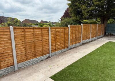 New fence panels on concrete posts installed by Middlemore Tree Surgery