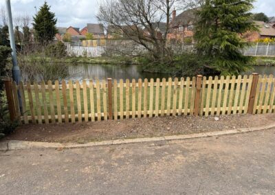 Timber picket fence installed along a front boundary
